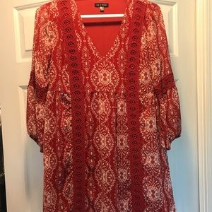 Orange and white patterned dress